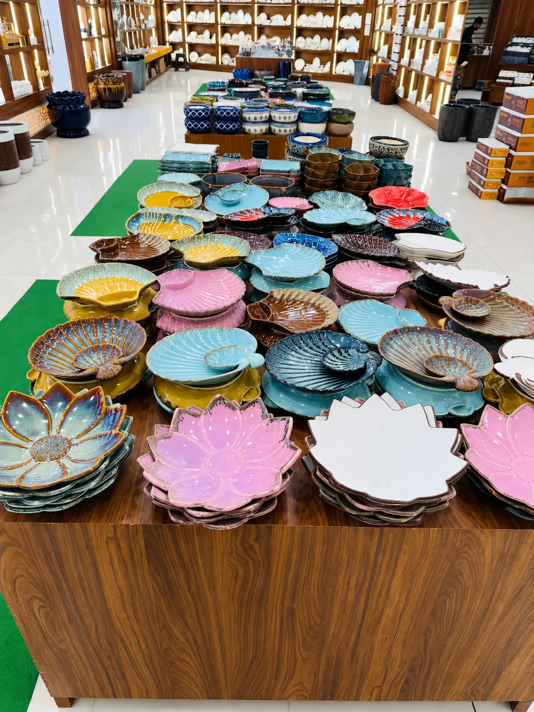 Decorative ceramic serveware collection inside Hira Industries showroom