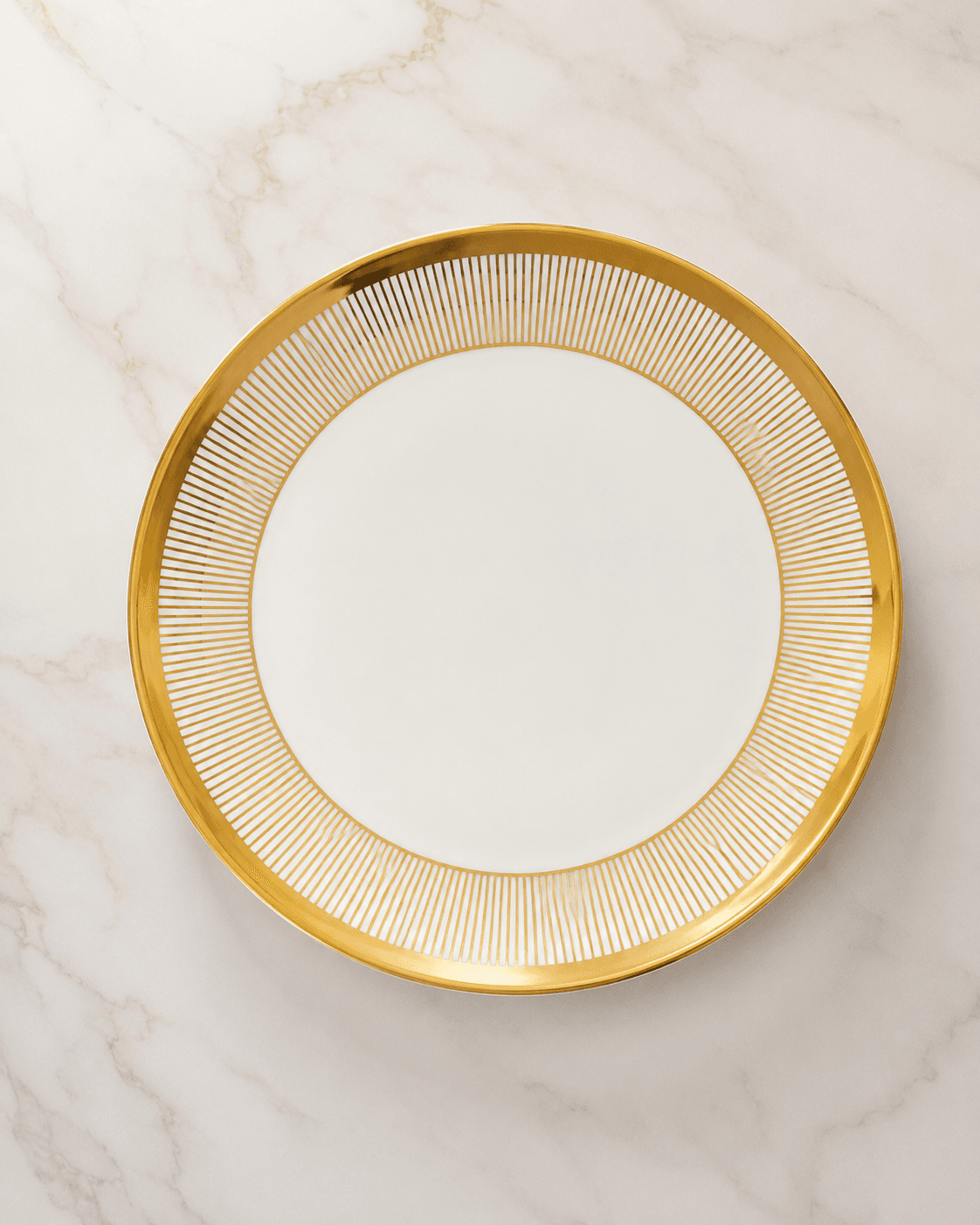 White ceramic plate with gold stripe border